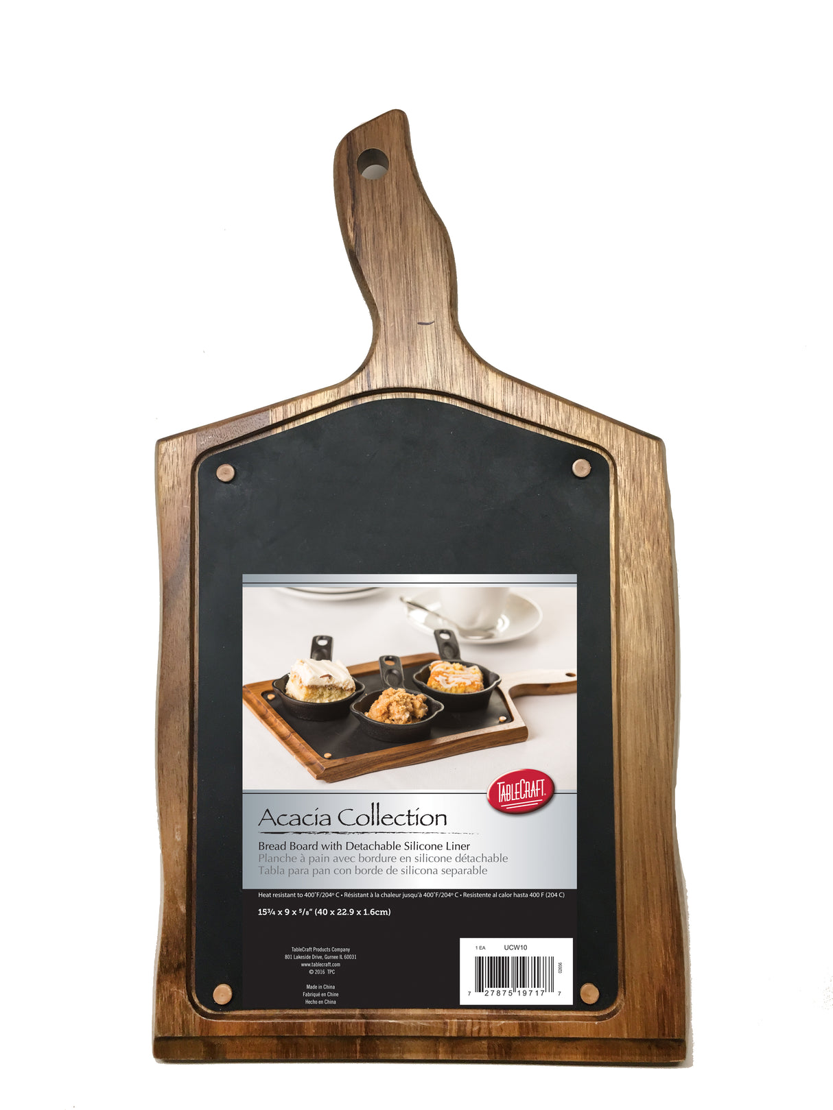 A wooden acacia cutting board with a handle, featuring a detachable silicone liner attached by brass screws. The Acacia Collection label reads Bread Board with Detachable Silicone Liner and shows food beautifully served on this wood serving tray.