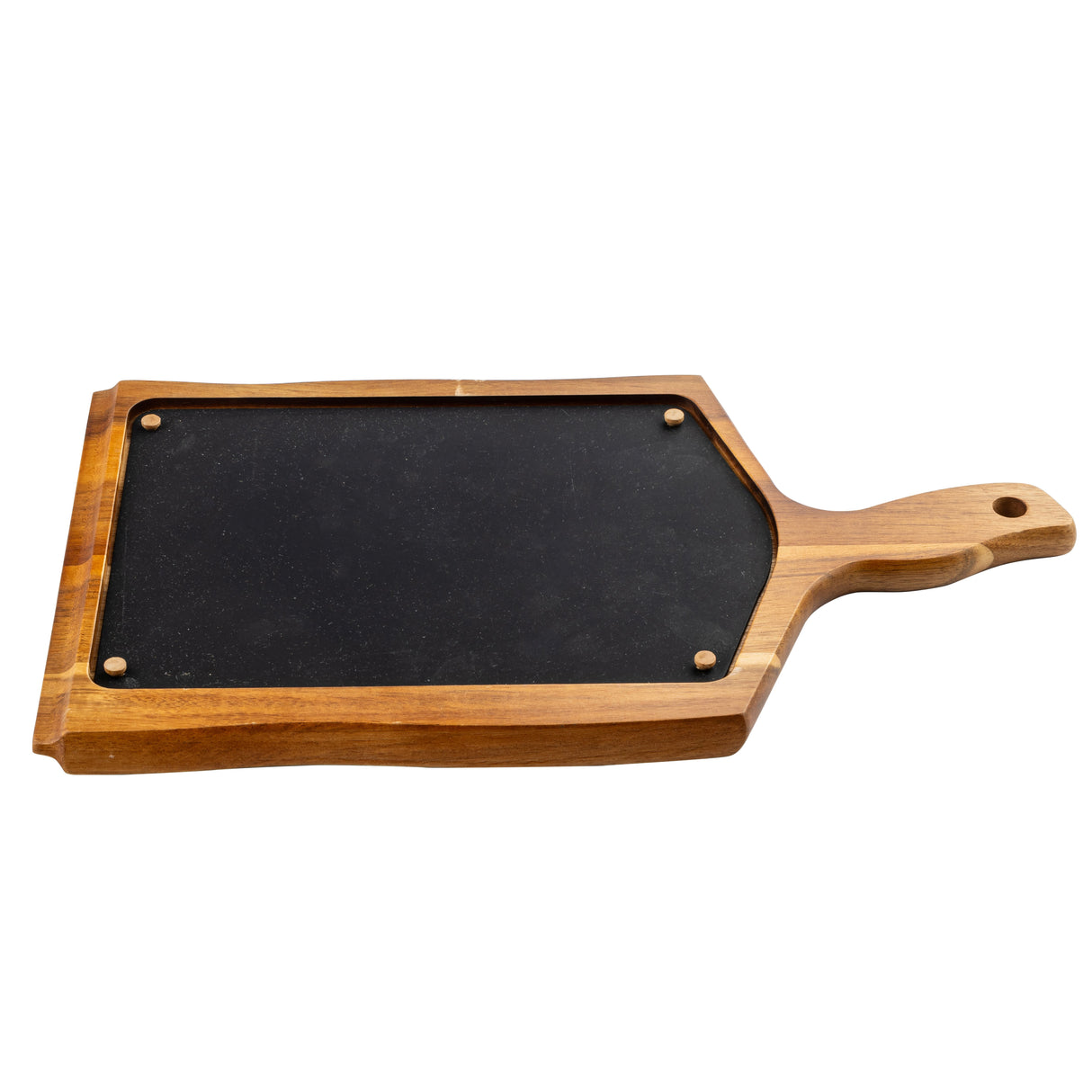 A rectangular wood serving tray with a handle and a hole for hanging, featuring a black, slate-like inset in the center secured by four brass screws at the corners. The board is isolated on a white background.