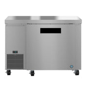 An ENERGY STAR commercial stainless steel undercounter refrigerator on wheels, with a digital temperature display reading 33°F, a large black handle, and a vented cooling panel on the lower left. The background is plain white.