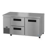 A Hoshizaki Steelheart Series commercial stainless steel undercounter refrigerator worktable with a solid top, two drawers, and one door with black handles, stands on four wheels. The left side features a vent and digital temperature display. Background is plain white.