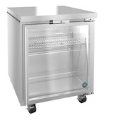 A stainless steel glass door refrigerator with a wire shelf and four wheels for mobility. The door is slightly ajar, revealing an empty interior. A round blue and white ENERGY STAR certification sticker sits on the bottom right corner of the door.