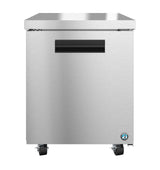 Stainless steel Hoshizaki commercial refrigerator on wheels, featuring a solid single door with a horizontal black handle and a small round blue-and-white label in the lower right corner. The front surface is smooth and reflective.