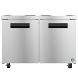 A Hoshizaki Steelheart Series commercial refrigerator with two side-by-side doors, black handles, and casters for mobility. The sleek stainless steel surface features a small blue manufacturer logo on the bottom right corner.