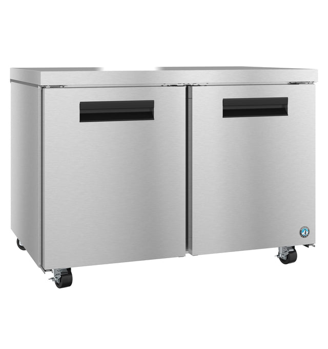 A Hoshizaki Steelheart Series commercial undercounter refrigerator with two doors, black horizontal handles, and four caster wheels. The smooth, reflective stainless steel surface is ideal for industrial kitchens, with the manufacturer's logo in the bottom right corner.