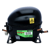 A black, oval-shaped Empura replacement compressor with copper pipes on both sides, a green label marked Secop NLE8.0CN and refrigerant R290, a yellow warning symbol, and mounting holes on its metal base—ideal for Empura ice machine parts needs.