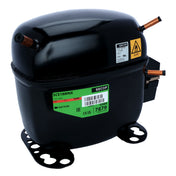 A black, cylindrical Secop refrigeration compressor—compatible with Empura ice machines like the E-MCF500—features copper pipes on both sides, a green label, warning sticker, and smooth, reflective surface with sturdy mounting brackets at its base.