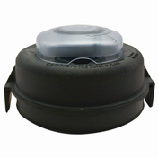 A black, round replacement blender lid with a raised, translucent gray handle on top. Cautionary instructions are embossed around the edge. Two flange-like extensions allow for grip or attachment. Ideal as a Vitamix blender lid for 32 oz containers. Background is plain white.
