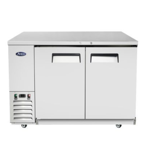 A silver commercial under-counter refrigerator, such as the Atosa SBB48GRAUS1 Back Bar Cooler, features two doors with black handles and ventilation on the bottom left side. The unit is on small wheels, has indicator lights, and displays a logo in the upper left corner. The surface is flat and stainless steel for a sleek, modern finish.