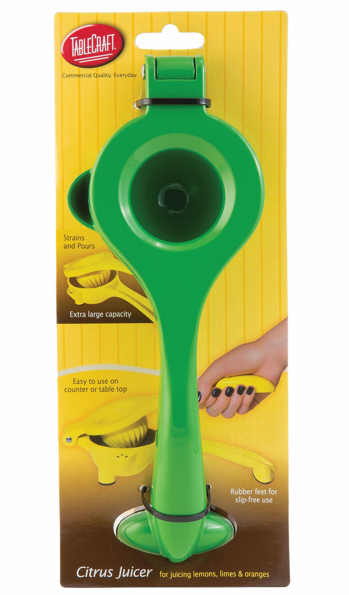 A bright green citrus hand squeezer, crafted from coated zinc alloy, is packaged against a yellow background. The packaging highlights its extra-large capacity, straining pour spout, rubber feet, and ease of use with the TableCraft brand logo at the top.