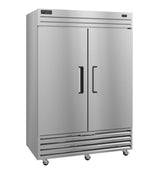 A large, commercial stainless steel double-door Valiance Series Freezer with black handles, vents at the bottom, small wheels for mobility, and a digital display on the top right. Its smooth, reflective surface features a rectangular brand label at the top left.