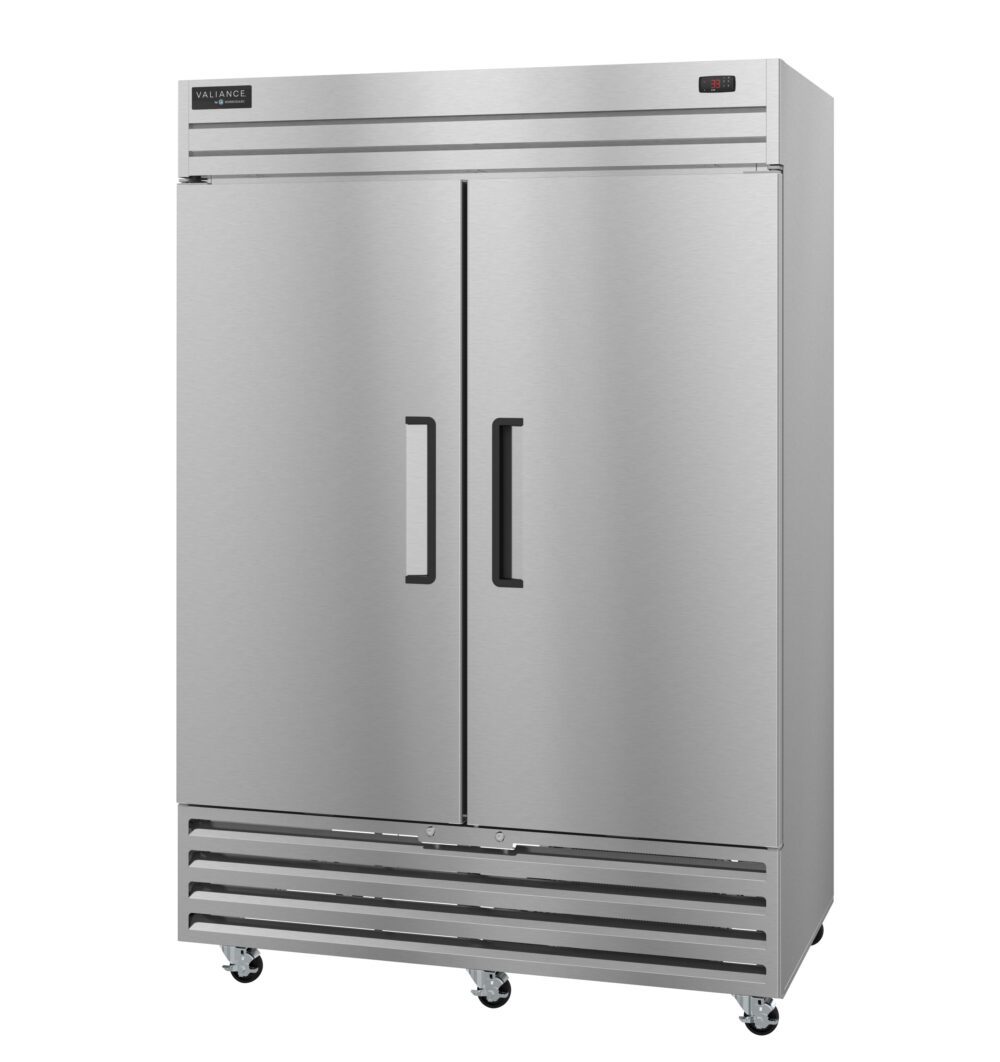 A large, double-door Valiance Series Refrigerator with vertical handles and ventilation vents at the bottom, mounted on four caster wheels. This two-section refrigerator features a digital temperature display in the top right corner.