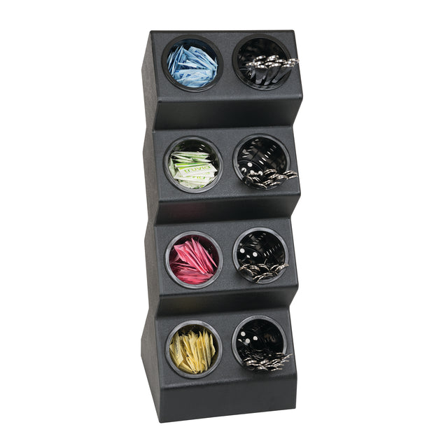 A black, angled countertop organizer with 8 compartments holds various coffee stirrers and colorful packets of sugar or sweeteners, arranged neatly against a white background.