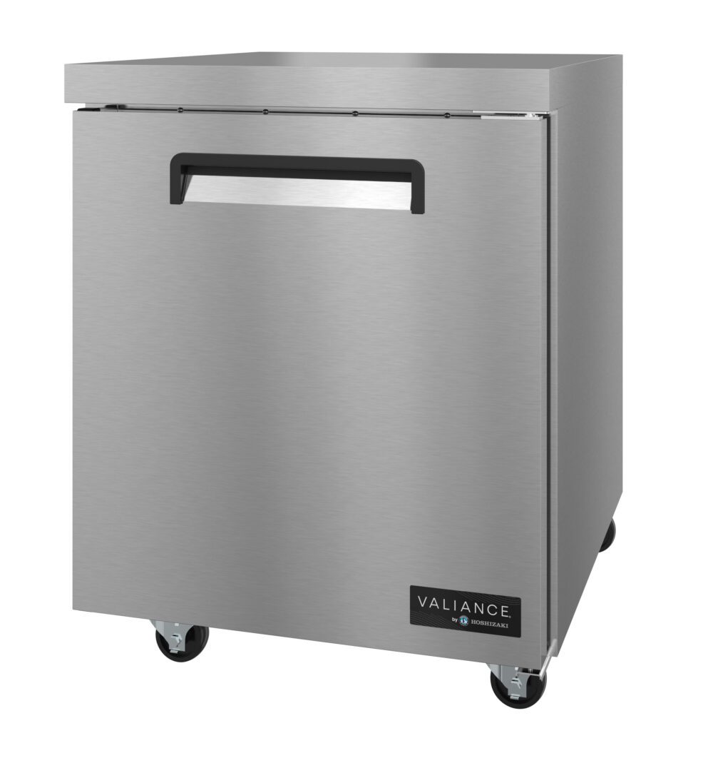 A stainless steel commercial refrigerator from the Valiance Series with a single solid door, recessed handle, and wheels for mobility. The sleek exterior features smooth surfaces and a Valiance by Migali logo at the bottom right corner.
