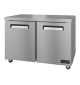 A sleek, modern Hoshizaki VUF48A undercounter freezer with two doors featuring horizontal black handles. The stainless steel unit sits on four caster wheels, displays the Valiance label, and boasts an industrial design perfect for commercial kitchens.