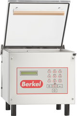 A Berkel 250-STD vacuum packaging machine with a single stainless steel chamber and an upward-opening transparent lid. The front panel includes a digital display, numbered buttons, and red indicator lights next to the bold Berkel logo.
