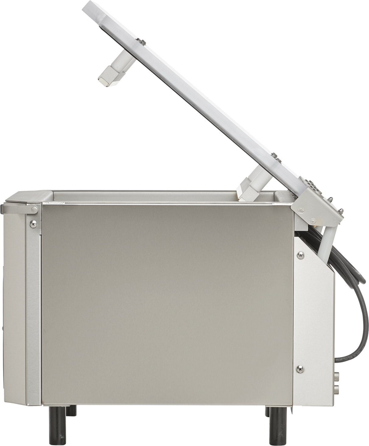 Side view of a single chamber vacuum packaging machine with its lid open at an angle. The stainless steel device features four black legs, a rectangular chamber, visible hinges and wiring for gas flush on the right side connecting the lid to the base.