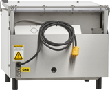A stainless steel Berkel Vacuum Packaging Machine with a single chamber features an open front displaying electrical components, a coiled black cable with a yellow plug, caution labels for electrical hazard and gas, various connection ports below, and a slightly lifted top lid.