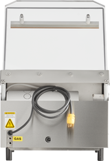 Front view of a Berkel single chamber Vacuum Packaging Machine in stainless steel with a hinged cover, yellow electrical plug on a black cord, and caution labels for electrical hazards and gas use. Background is plain white.