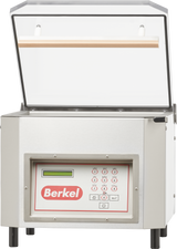 A silver Berkel single chamber Vacuum Packaging Machine with a transparent lid opening upwards. The front panel features a digital display, keypad with multiple buttons, and the red Berkel logo. Its rectangular design looks industrial and modern.