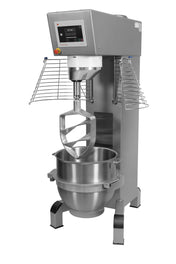 A 100Q Heavy Duty Planetary Mixer with a digital control panel, safety guard, large stainless steel mixing bowl, and flat beater attachment. This programmable planetary mixer features a sturdy base, ideal for industrial or bakery use.