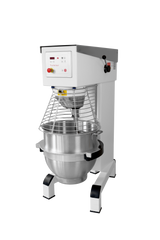 A commercial Varimixer planetary mixer with a large 100 quart stainless steel mixing bowl, safety wire guard, and electronic control panel. It features a sturdy white and black frame, with all controls conveniently located on the front upper section.
