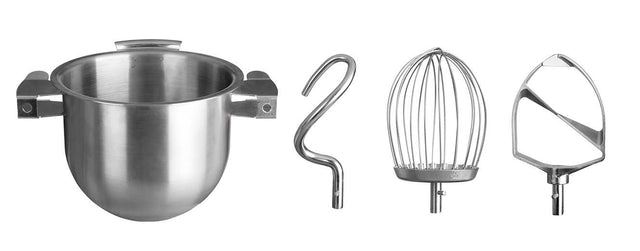 A stainless steel bowl sits next to three 20 quart mixer attachments: a dough hook, a heavy wire whip, and a flat beater, all arranged in a row on a white background.