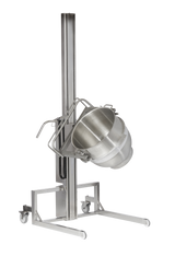 The Varimixer Maxilift Inox is a stainless steel industrial mixing bowl lift with a 140 L capacity, featuring a vertical frame on wheels and a tilting mechanism to securely hold and rotate large bowls for easy pouring. Positioned against a plain white background.