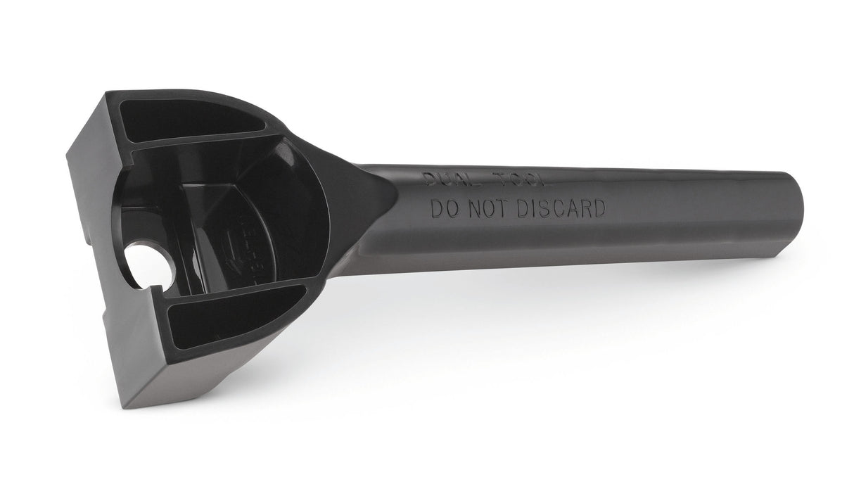 A black plastic Retainer Nut Wrench designed for Vitamix blenders, featuring a hexagonal socket at one end and an elongated handle embossed with “DO NOT DISCARD.” The socket suits models like The Quiet One, with a large circular hole and squared openings.