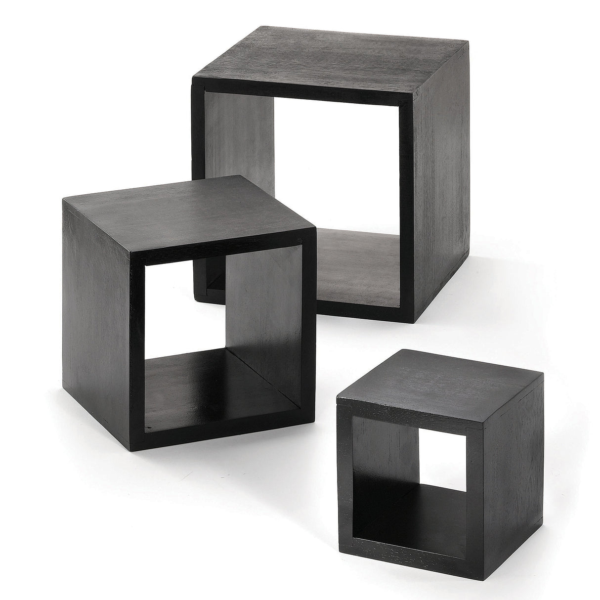 Three black, open-frame cube tables of varying sizes are arranged on a white background. Reminiscent of a wood riser set, each hollow cube features a smooth matte finish and clean, modern lines, perfect for stylish displays with TableCraft Products.