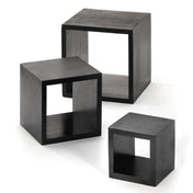 Three black, open-frame cube tables of varying sizes are arranged on a white background. Reminiscent of a wood riser set, each hollow cube features a smooth matte finish and clean, modern lines, perfect for stylish displays with TableCraft Products.