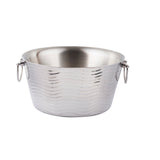 A shiny, round stainless steel beverage tub with a wavy textured pattern and double wall construction, featuring two metal ring handles on opposite sides, shown on a plain white background.