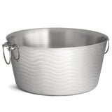 A large, round double wall stainless steel beverage tub with a brushed finish and wave-patterned texture. It features two metal handles for easy carrying, a smooth, reflective interior, and a slightly flared rim.