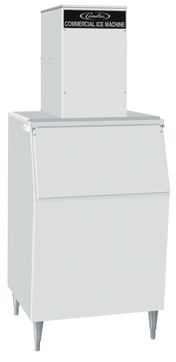 A large, silver, rectangular air-cooled ice maker with a black sign labeled Commercial Ice Machine on the top unit. It has a wide front door for ice retrieval and stands on four metal legs. The design is industrial and utilitarian.