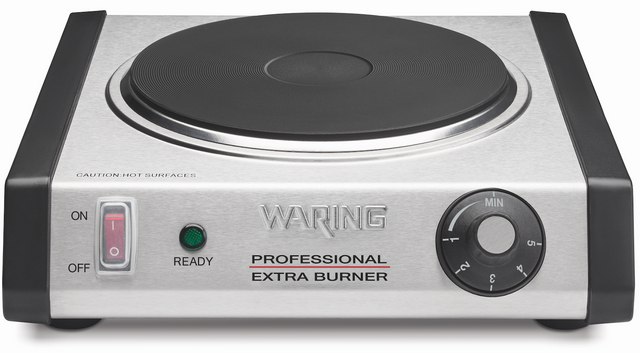 A stainless steel single-burner hot plate with a black coil, adjustable thermostat, ON/OFF switch, green “READY” light, temperature dial from MIN to MAX, and “WARING PROFESSIONAL EXTRA BURNER” on the front. CAUTION: HOT SURFACES is engraved on top.