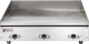A commercial-grade countertop appliance, this stainless steel electric griddle features three black thermostatic control knobs on the front. The Wolf logo is on the lower left. Its smooth flat-top surface and raised edges help prevent spills.