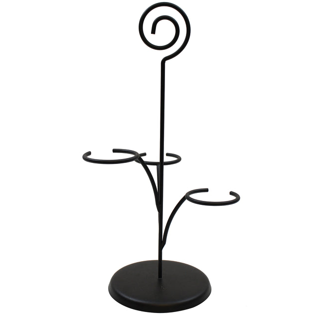 A black powder coated metal stand with a round base, two curved arms for holding items, and a vertical rod topped with a spiral loop. The minimalist design is perfect as a wine glass holder or for showcasing a Cascade Tasting Flight.