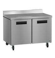 A sleek Hoshizaki stainless steel undercounter refrigerator with two swing doors, black handles, four caster wheels, a smooth countertop, and a raised backsplash—perfect for any professional kitchen.