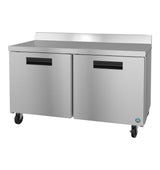 The Hoshizaki WF60B Steelheart Series worktop freezer features stainless steel construction, two side-by-side doors, black handles, a sleek countertop with backsplash, and four caster wheels—perfect for any modern kitchen.