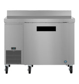 This ENERGY STAR worktop refrigerator features a sleek stainless steel design, digital temperature display, large door, flat top surface, and rear backsplash. Its mobility and industrial style make it ideal for commercial kitchens.