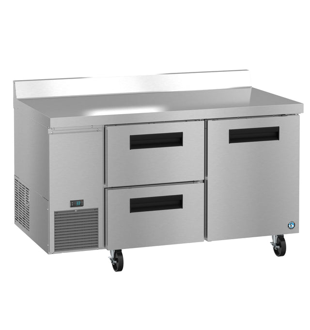 A Hoshizaki worktop refrigerator with two large stainless steel doors, two drawers, black handles, digital temperature display, left-side ventilation, four wheels for mobility, a flat countertop, and backsplash.