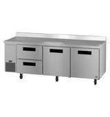 A large Hoshizaki Steelheart stainless steel undercounter worktop refrigerator with two drawers on the left and two solid doors on the right, all with black recessed handles. The unit is on wheels and features a flat backsplash along the top rear edge.