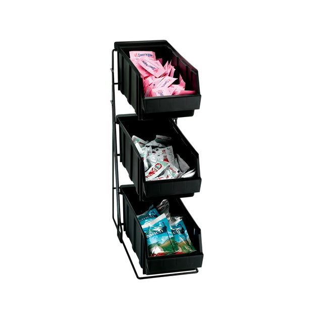 A three-tiered Packeted Condiment Organizer with removable plastic bins holds pink, white, and blue sweetener packets. Supported by a sturdy wire rack, it stands out against a crisp white background.