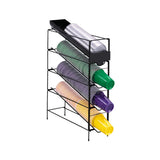 A black metal cup dispenser features an adjustable wire rack holding four rows of neatly stacked plastic drinking cups in clear, green, purple, and yellow. Each row aligns open ends outward against a plain white background in this one-size-fits-all design.