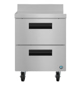 A stainless steel worktop refrigerator features 2 drawers with black handles, set on four wheels for easy mobility. Its smooth surface and blue certification sticker make it ideal for commercial kitchen use against a plain white background.