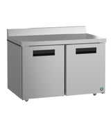 A commercial stainless steel worktop refrigerator with two solid doors, recessed handles, a flat backsplash, and caster wheels. Its sleek, industrial design is ENERGY STAR certified—ideal for any professional kitchen or food service environment.