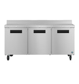 This ENERGY STAR stainless steel worktop refrigerator features three front doors, black recessed handles, a raised rear backsplash, and four caster wheels—perfect for efficient use in any professional kitchen.