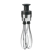 A metal rotary hand whisk with two looped stainless steel beaters, a cylindrical black handle, and a silver band near the top. The handle has a plunger for manual operation. Resembles the Waring Big Stix Whisk Attachment, upright on white background.