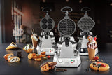 Three commercial waffle cone makers, including a Waring model with non-stick plates, are displayed on a counter. Around them are various waffle cones—some bubble-style—filled with ice cream, cookies, fruit, chocolate, and scattered dessert bars.