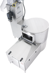 A large, industrial stainless steel Hobart machine with a rectangular base, cylindrical chamber, and attached components including a motorized drain valve, control box, and wires. Its smooth surface features a prominent handle and small viewing window on the cylinder.
