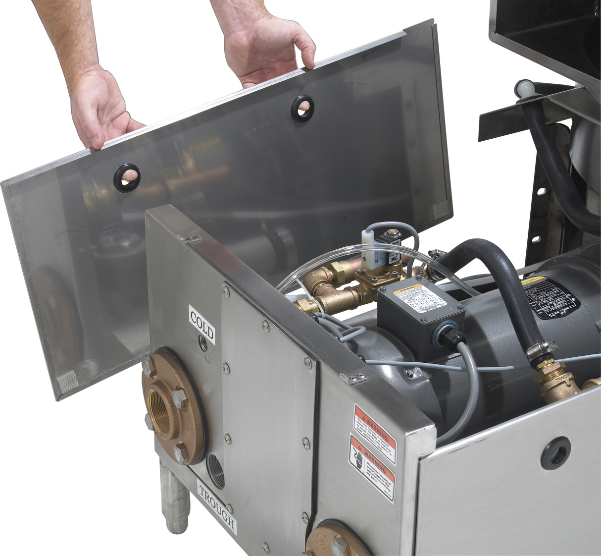 A person lifts a stainless steel panel from a Hobart WastePro self-contained pulper, revealing internal mechanical components like pipes, wiring, and a motorized drain valve. The unit is labeled COLD and INCOMING with visible warning and instruction labels.